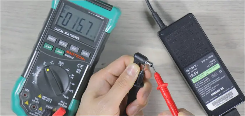 Check the output voltage of the AC adapter using a multimeter