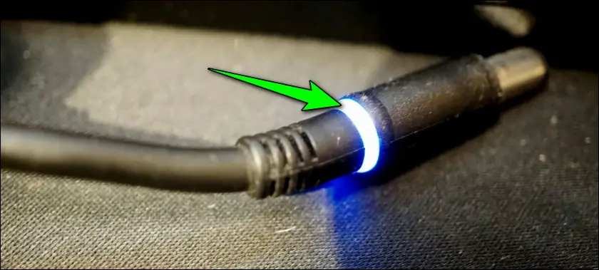 the LED on the AC power adapter plug